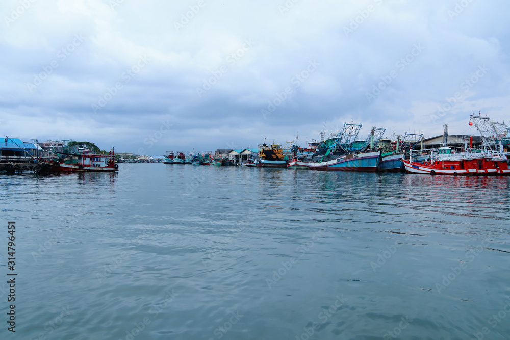 The fishing boat parked at the bay