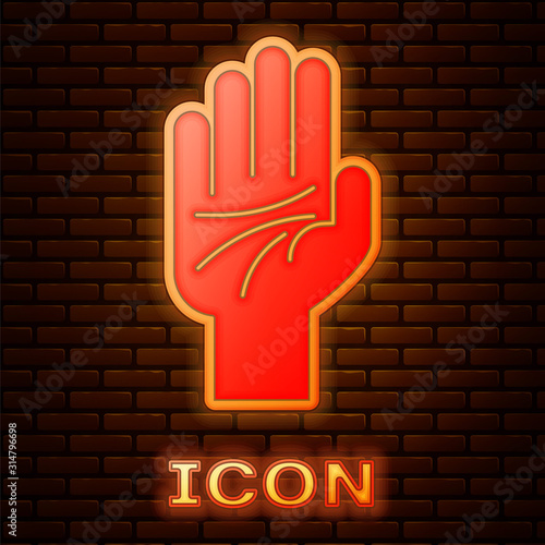 Glowing neon Palmistry of the hand icon isolated on brick wall background. Vector Illustration
