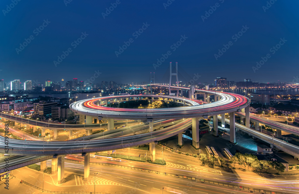 Modern bridge at night in Shanghai China.