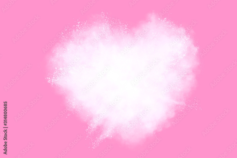 Fototapeta premium White powder explosion on pink background.