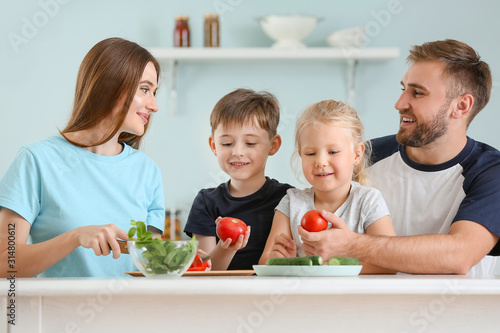 Happy family cooking togeth...