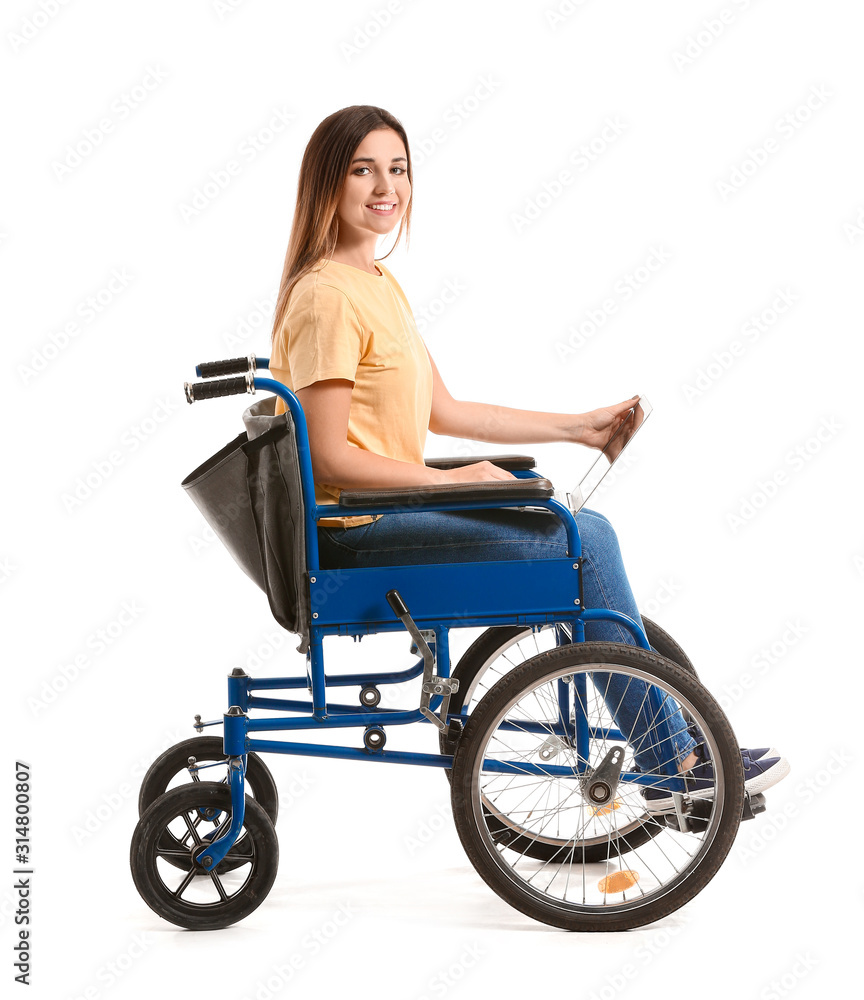 Young woman in wheelchair and with laptop on white background Young woman in wheelchair and with laptop on white background