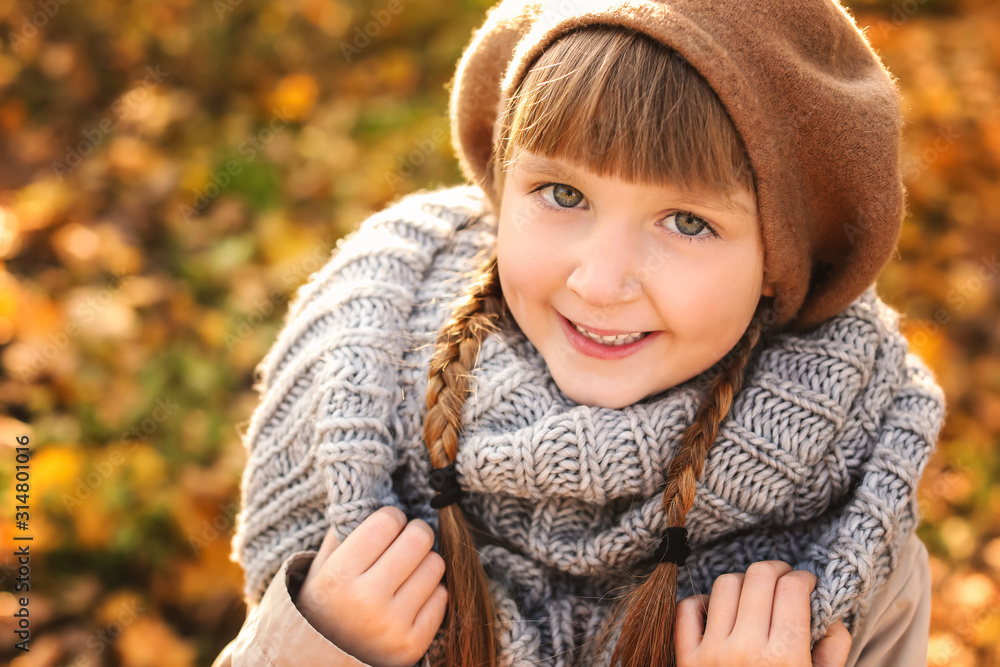 Cute little girl in autumn park Cute little girl in autumn park
