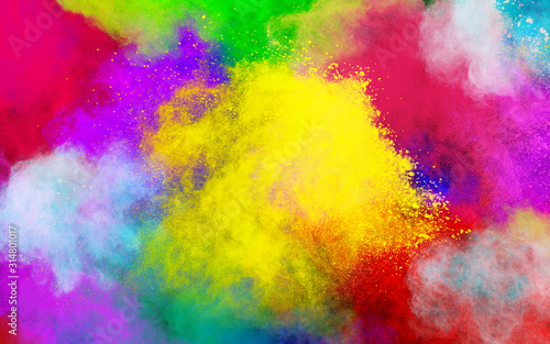 Colorful powder explosion on white background. Colored cloud. Colorful dust explode. Paint Holi. © piyaphong