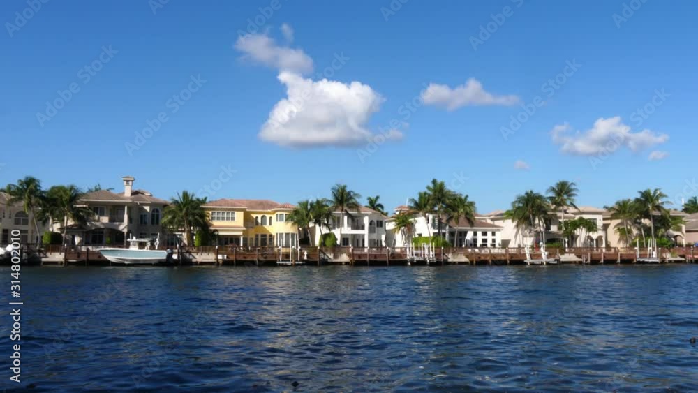 Luxury prime real estate homes on Hollywood Waterway, establishing shot Luxury prime real estate homes on Hollywood Waterway, establishing shot