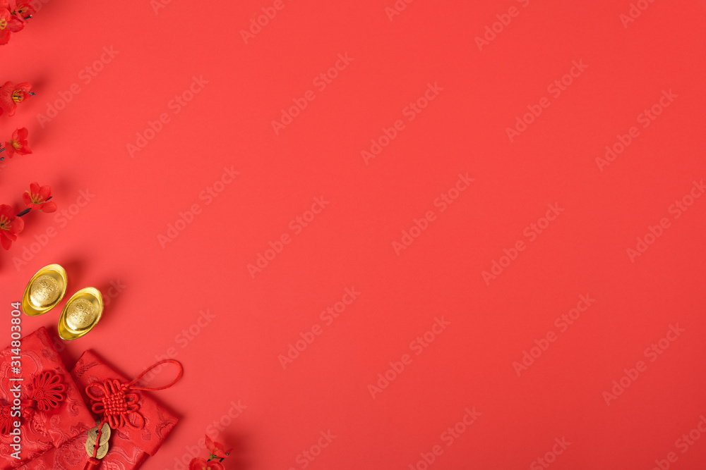 Chinese new year festival concept, flat lay top view, Happy Chinese new year with Red envelope and gold ingot Chinese new year festival concept, flat lay top view, Happy Chinese new year with Red envelope and gold ingot