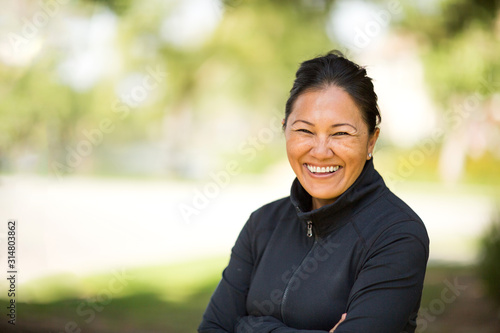 Portrait of a fit Asian woman exercising.