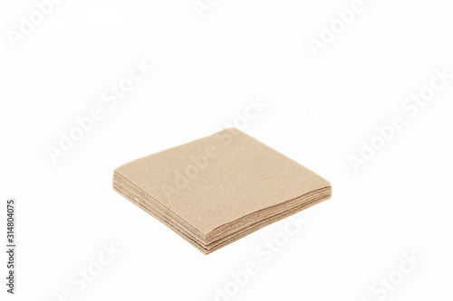 Eco kraft paper tableware. Paper napkins isolated on white background. Recycling concept. Zero waste.