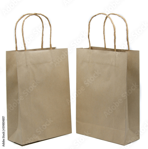 Blank brown paper bags isolated on white background