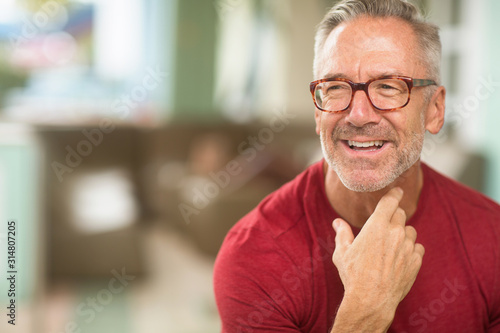 Mature handome fit man sitting outside stock photo