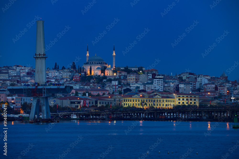 Yavuz Selim Mosque Istanbul at dawn with construction to replace Ataturk Bridge over the Golden Horn