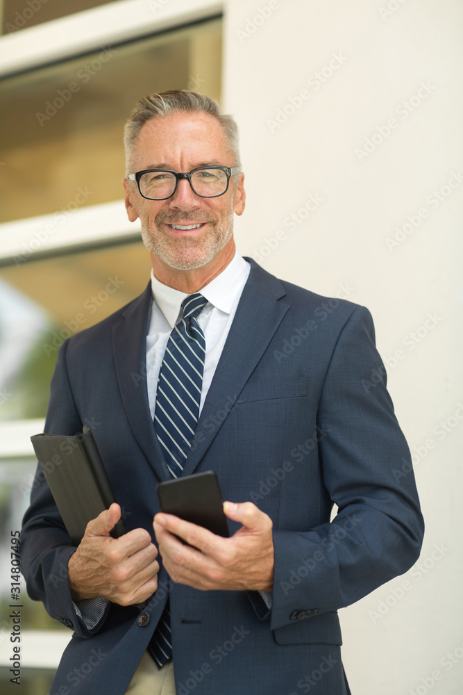 Portrait of a handsome mature confident businessman Portrait of a handsome mature confident businessman
