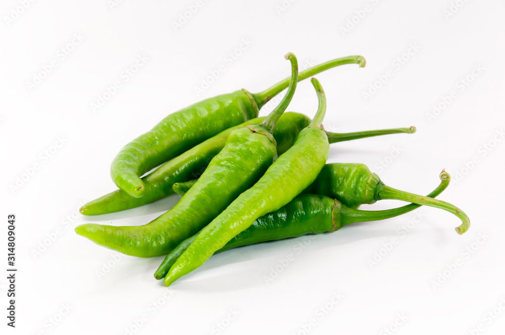 green chilli on white background green chilli on white background