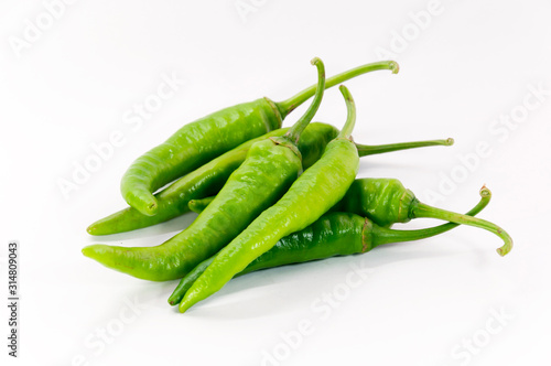 green chilli on white background