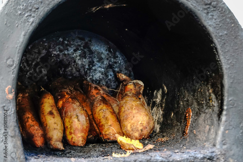 Cairo, Egypt A stall selling baked sweet potatoes, roasted in an oven, in the Dokki neighbourhood. photo