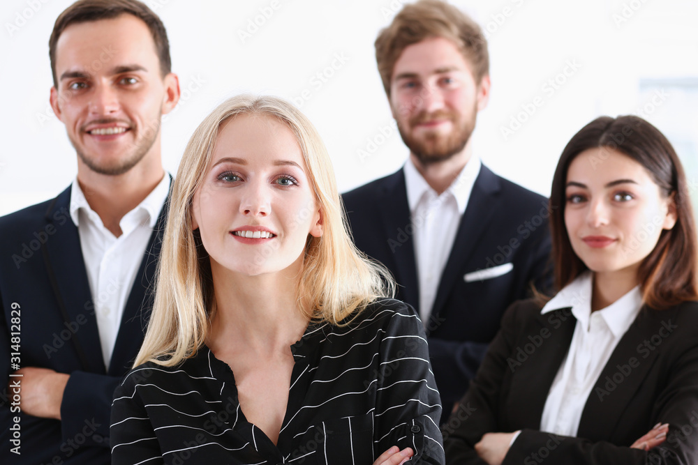 Group of smiling people stand in office looking in camera portrait. White collar power mediation solution project creative advisor participation profession train bank lawyer client visit concept Group of smiling people stand in office looking in camera portrait. White collar power mediation solution project creative advisor participation profession train bank lawyer client visit concept