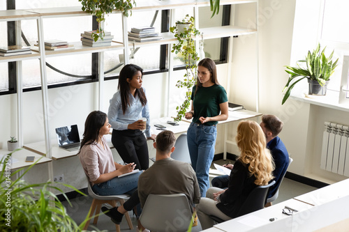Εκτύπωση καμβά Concerned diverse office employees gather together solve business problems
