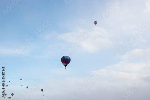 The hot air baloons fest in Russia. Apples on the snow. Colorfull balloons in the winter skye