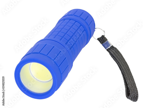 plastic led flashlight on a white photo