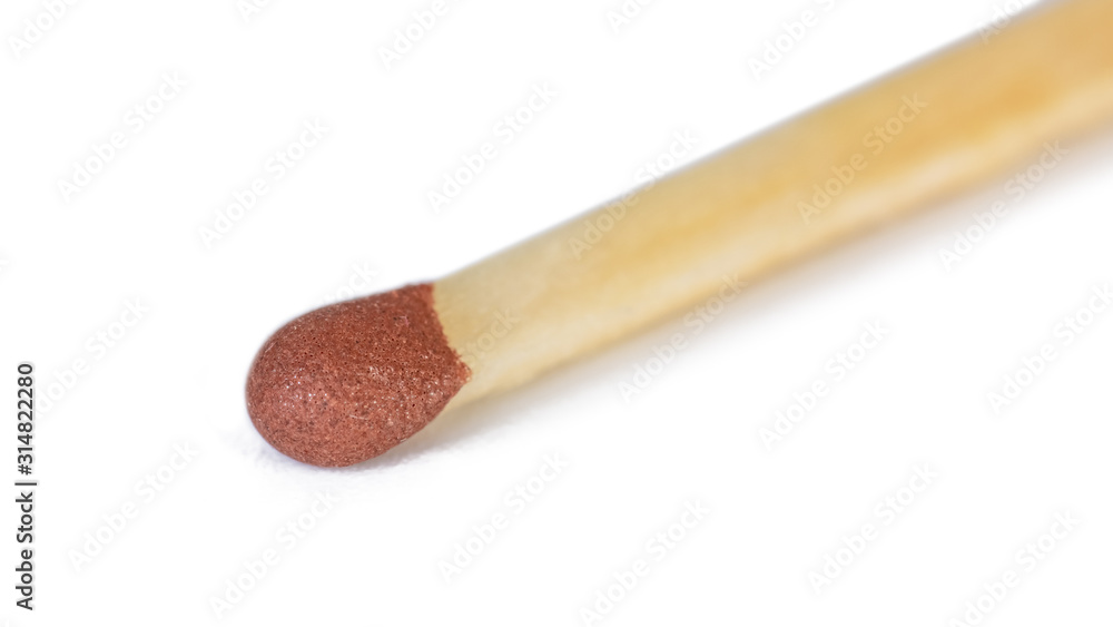 Closeup of red match isolated on white background Closeup of red match isolated on white background