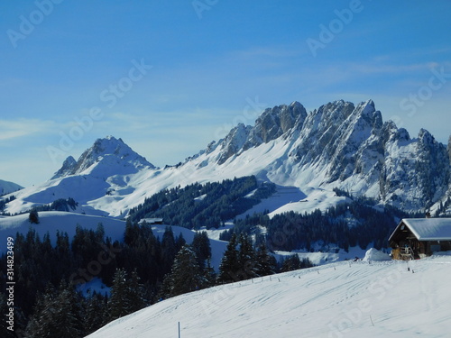 Winter alpine landscape of Jaun Pass, Switzerland photo