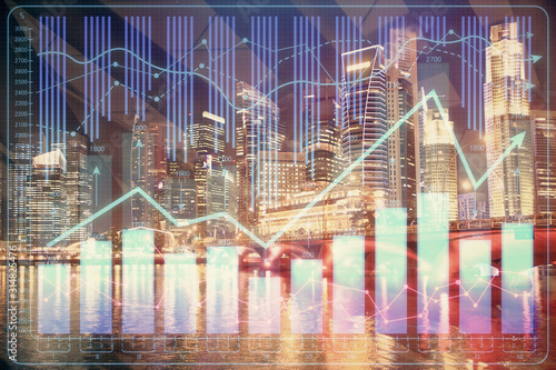 Financial chart on city scape with tall buildings background multi exposure. Analysis concept. © peshkova