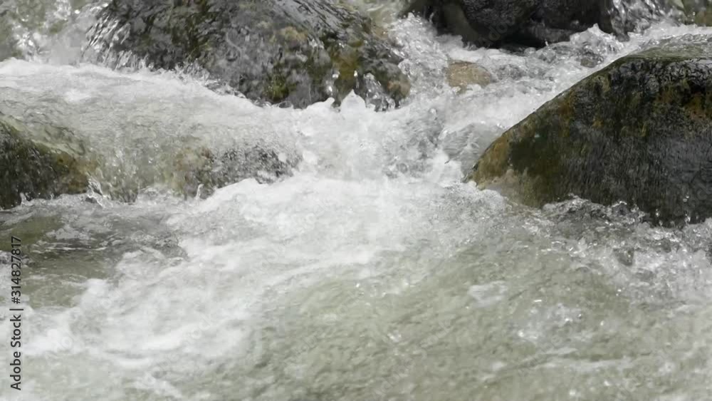 waterfall of wild stream in the mountains waterfall of wild stream in the mountains