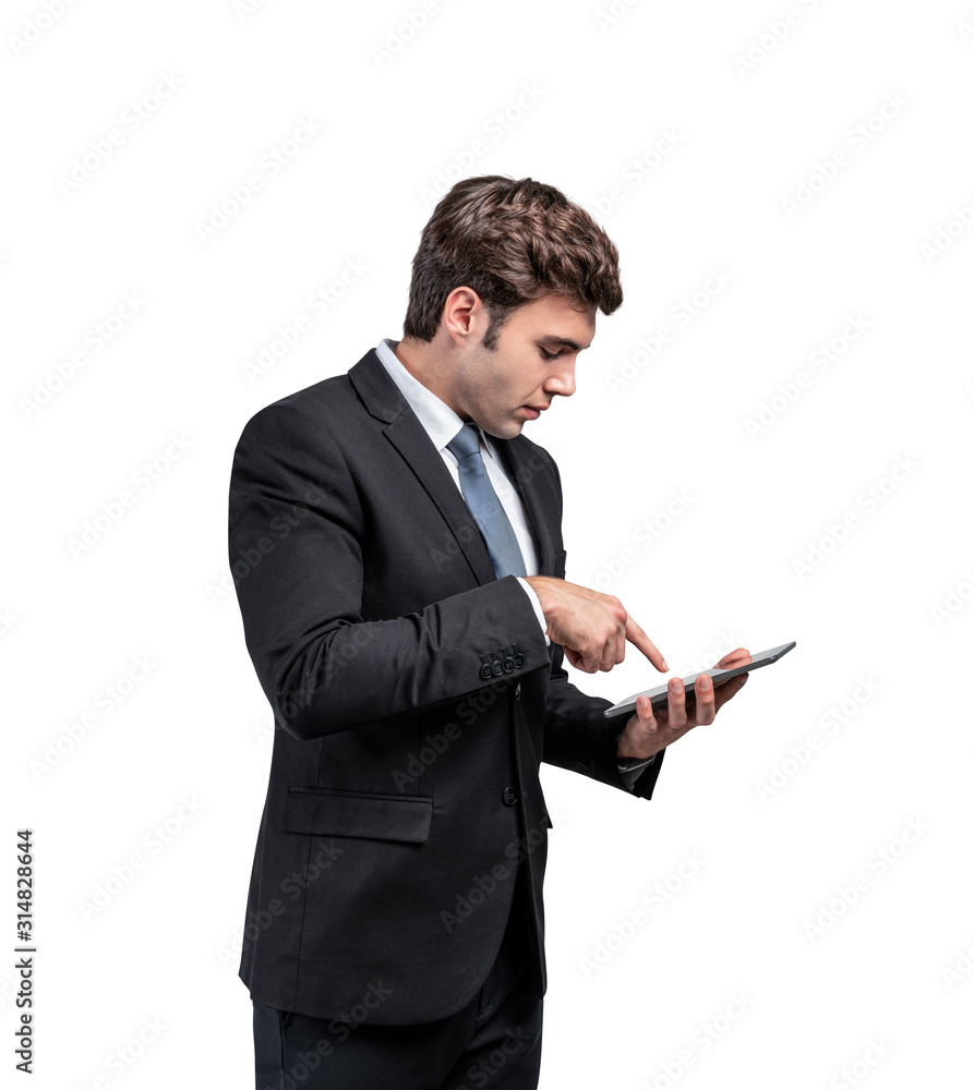 Young businessman using tablet, isolated Young businessman using tablet, isolated