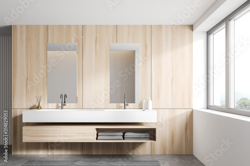 White and wooden bathroom interior, double sink