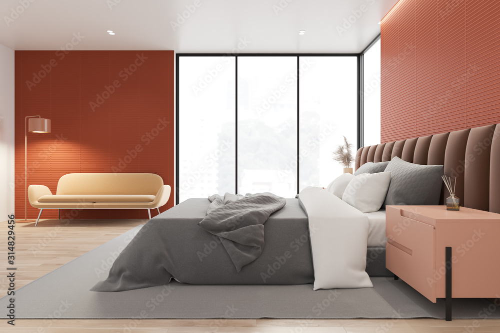 Fototapeta premium Orange master bedroom with sofa