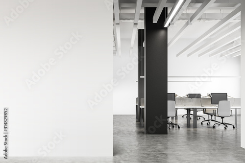 White industrial style office with mock up wall