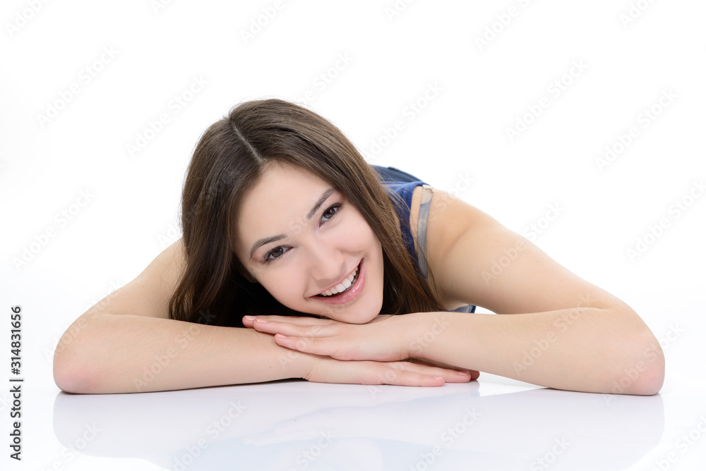 Full length portrait of attractive teen girl looking at camera and smiling over white Full length portrait of attractive teen girl looking at camera and smiling over white