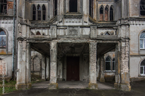 Facade of Tereschenko Palace in neogothic style. Chervone, Zhytomyr oblast, Ukraine photo