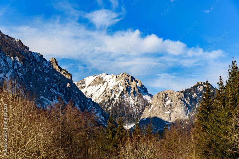 Peaceful mountain view of Hochschwab mountains Tragos, Oberort in Austria Styria. Tourist destination lake Gruner See in winter.
