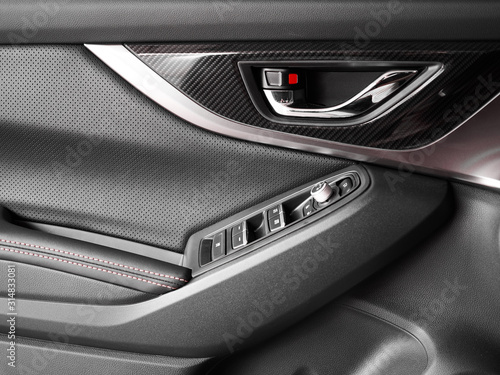 Close up door black interior of modern car © Владислав Винокуров