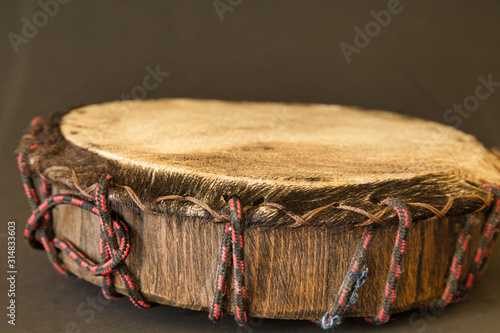 Mexican pre-Hispanic instrument, drum, Huéhuetl: percussion instrument made of wood and leather photo