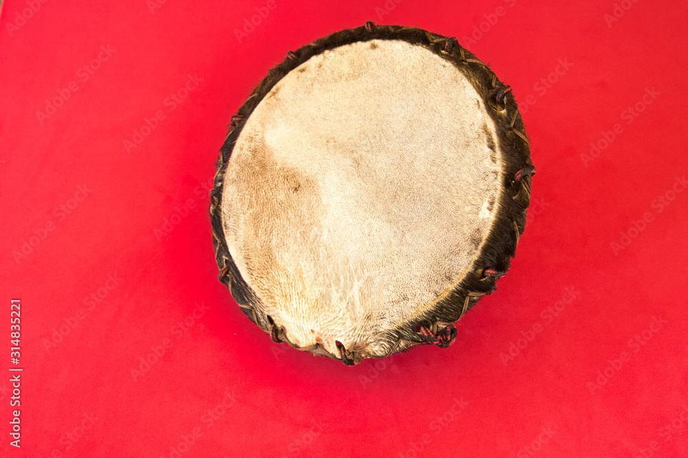 Mexican pre-Hispanic instrument, drum, Huéhuetl: percussion instrument made of wood and leather Mexican pre-Hispanic instrument, drum, Huéhuetl: percussion instrument made of wood and leather