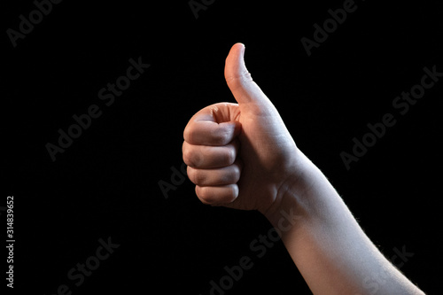 hand with thumb up isolated on white background