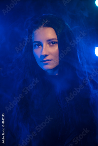 neon light and portrait of a girl. © Aliaksei