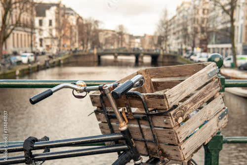 Bike on canal in Amsterdam