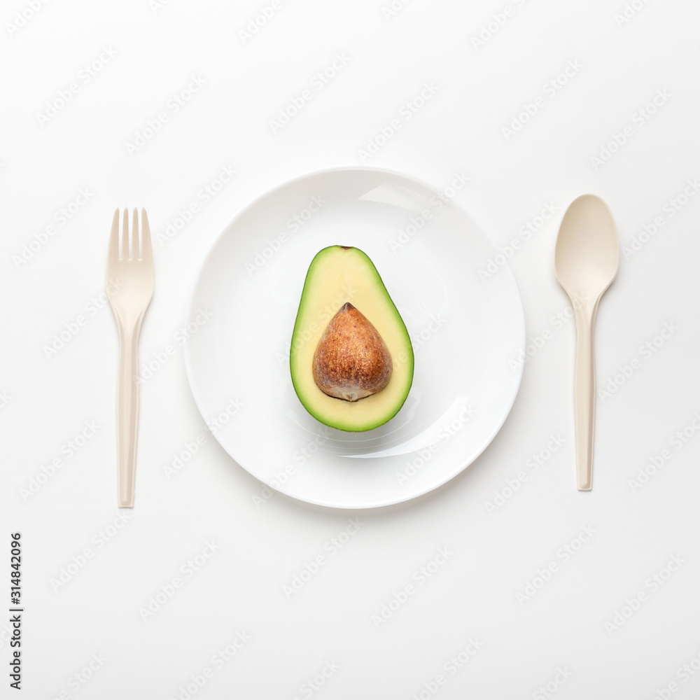 Eating of bioplastic single use cutlery of avocado seeds Eating of bioplastic single use cutlery of avocado seeds