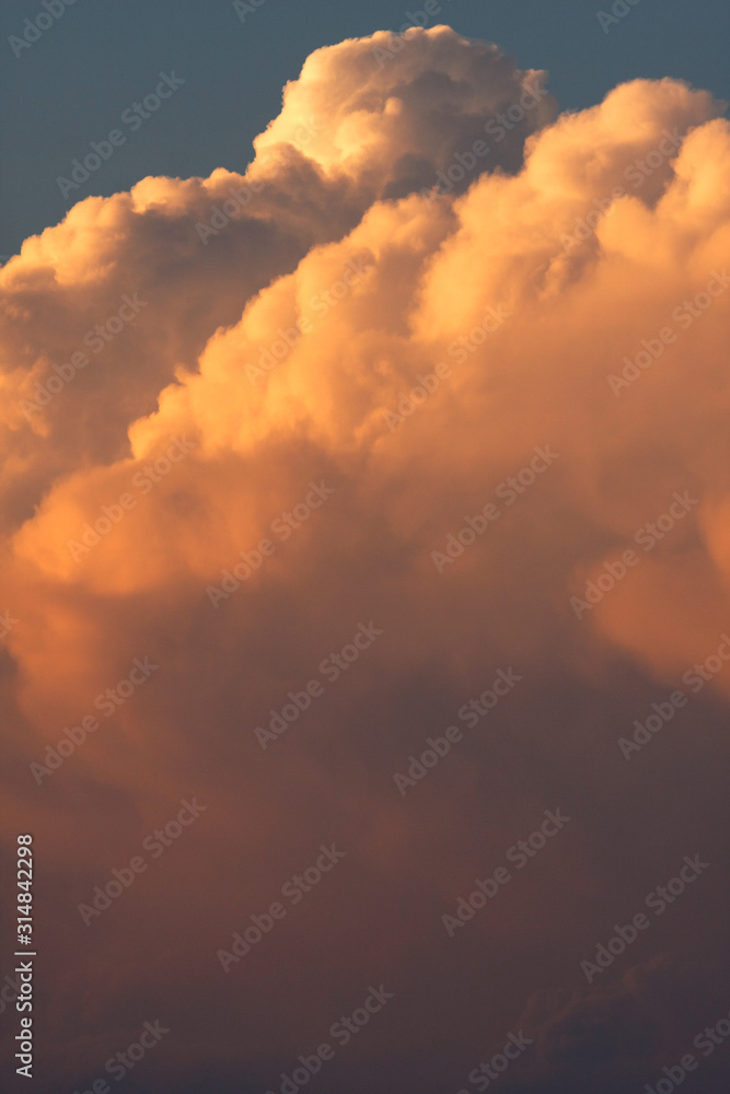 View of the clouds lit by the sunset