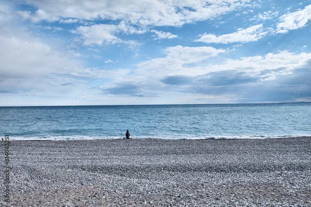 man walking on the beach