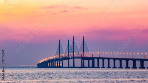 4K Time Lapse view of sunrise from Penang Bridge of George Town