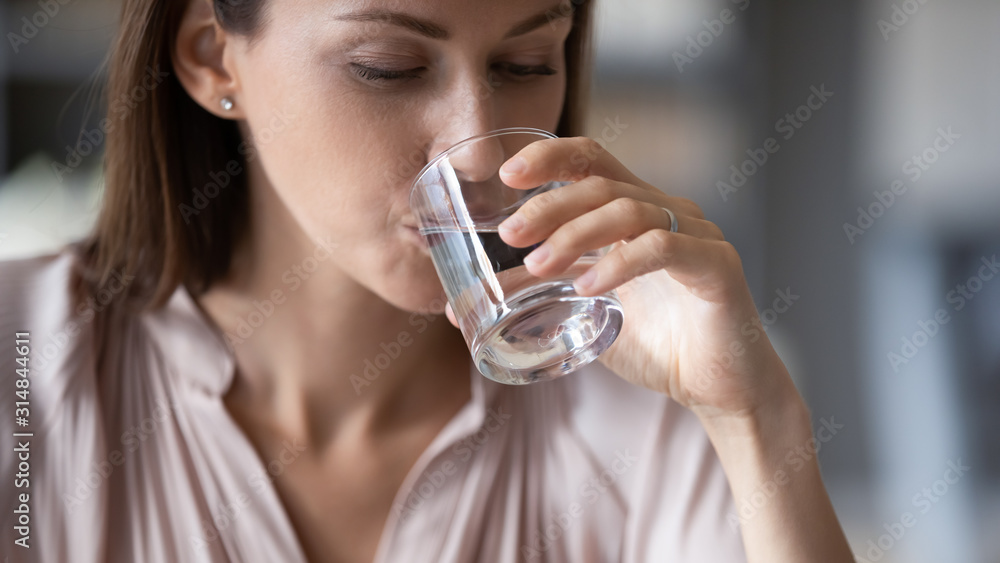 Young woman feel thirsty drink still mineral water Young woman feel thirsty drink still mineral water