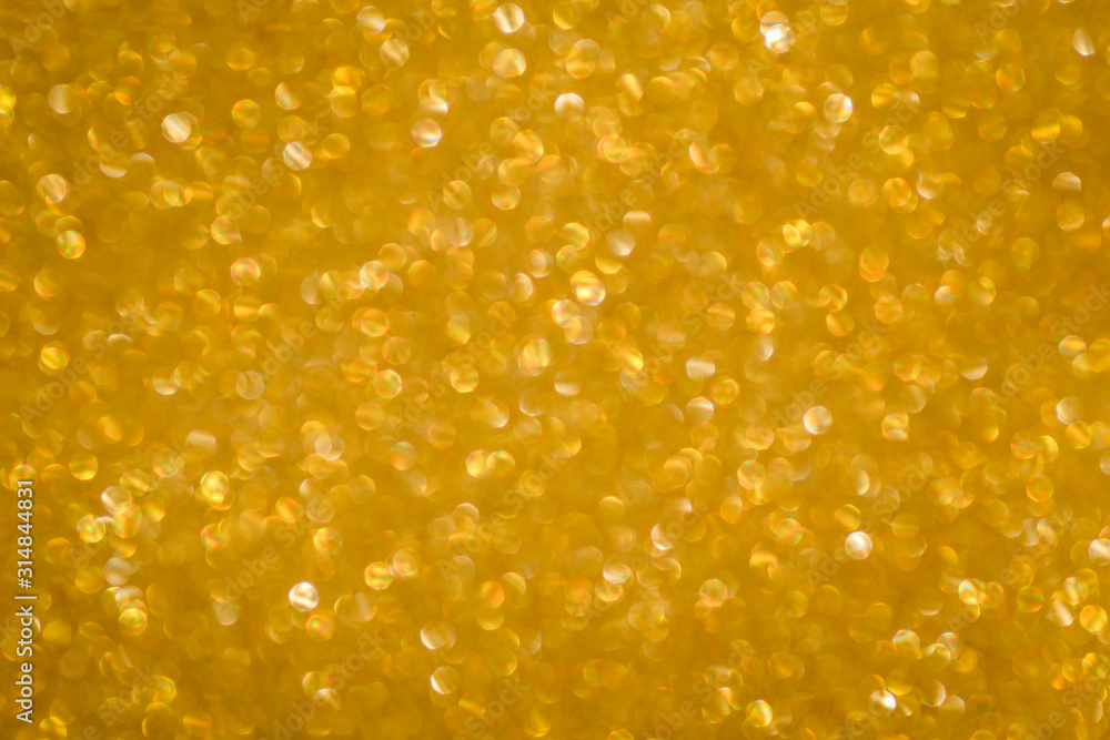 Gold background light. Golden glitter texture. Gold background light. Golden glitter texture.