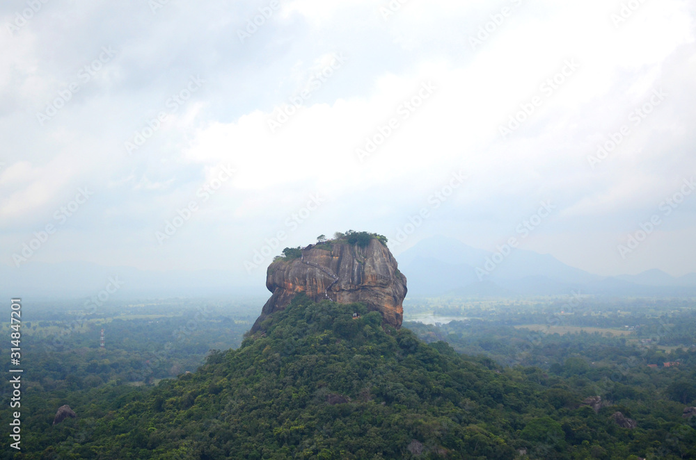 Sigiriya or Sinhagiri is an ancient rock fortress located in the northern Matale District near the town of Dambulla in the Central Province, Sri Lanka. 