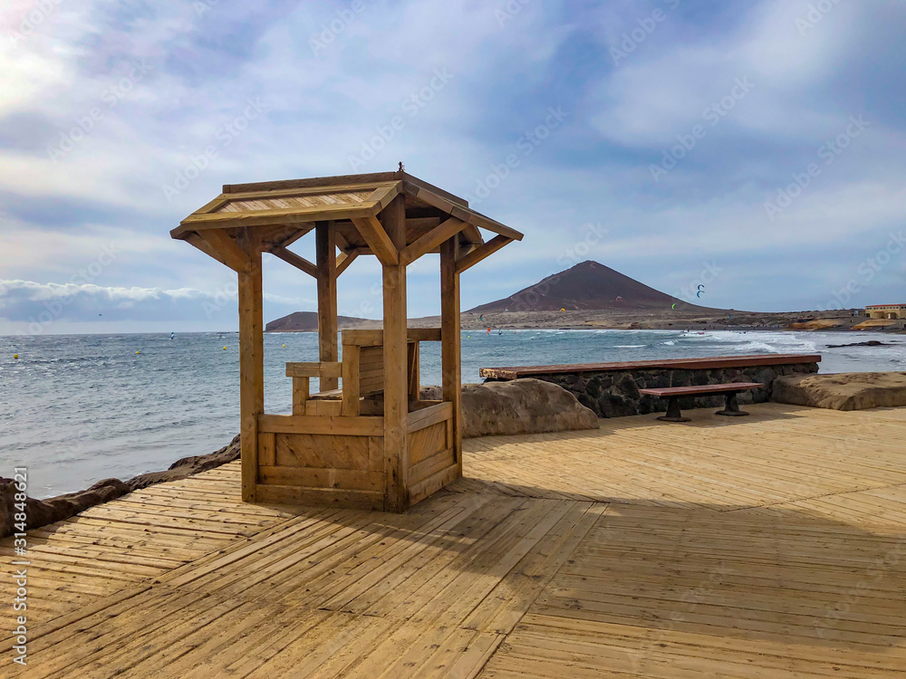 View of the beach, the Atlantic Ocean and the mountainous landscape in El Medano in Tenerife View of the beach, the Atlantic Ocean and the mountainous landscape in El Medano in Tenerife