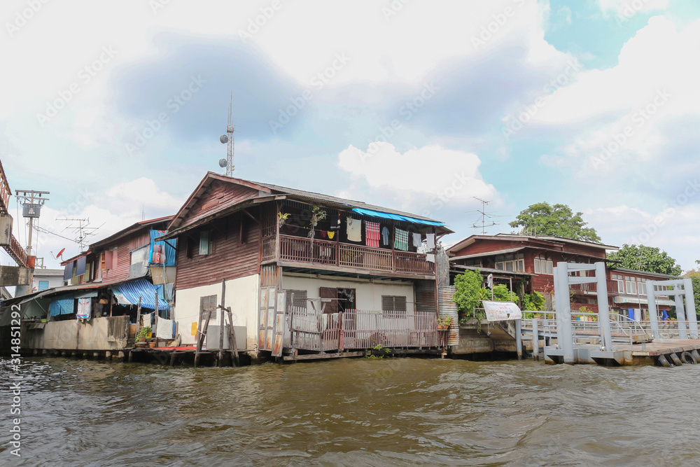 Old house on the river in Bangkok Thailand