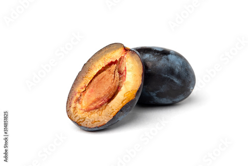 Fresh plum isolated on white background.